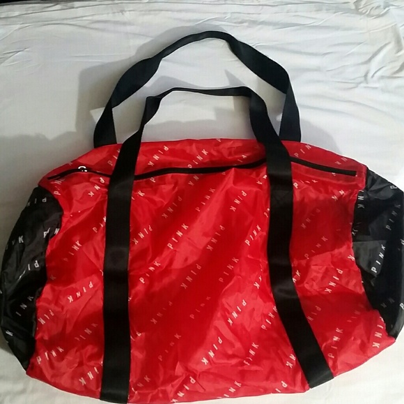 black and white pink duffle bag